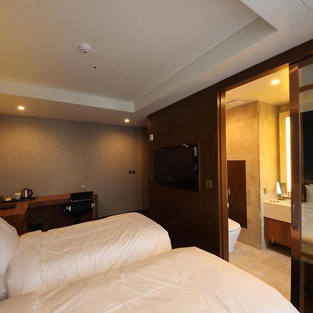 Benikea The H Hotel Hwaseong Quarto foto