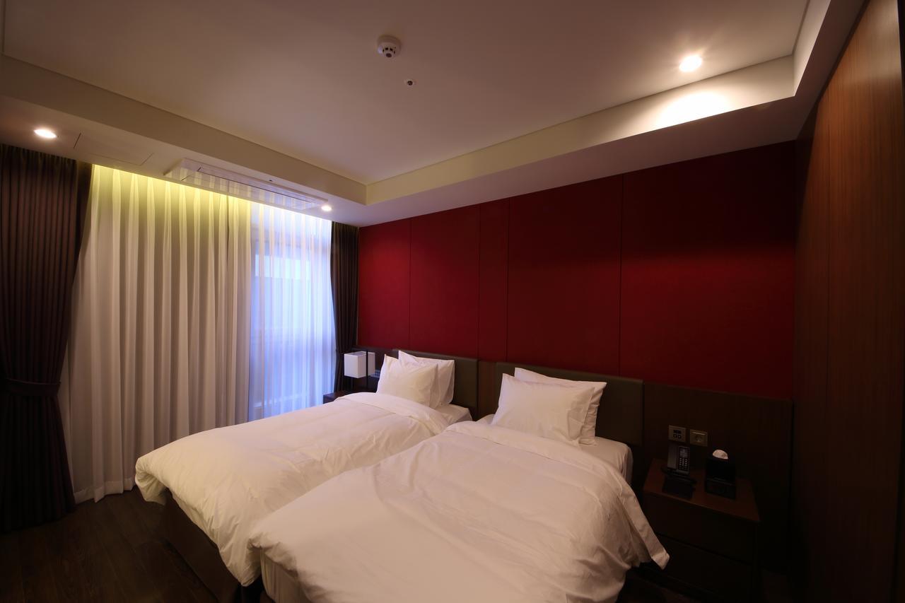 Benikea The H Hotel Hwaseong Quarto foto